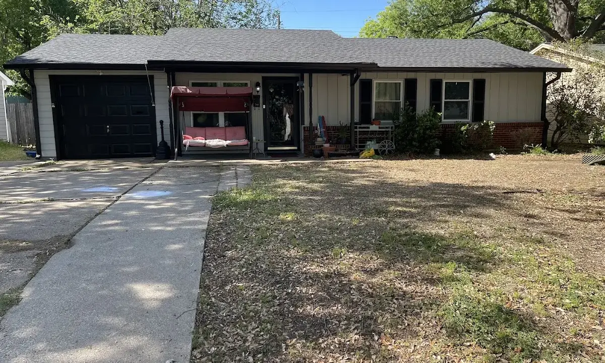 Metal Roof Installation crew at work on a residential roof in Robertsdale